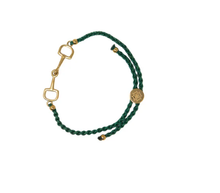 Green braided bracelet with gold horse bit clasp on a white background