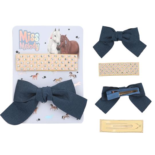 Set of hair bows with packaging featuring 'Miss Melody' on a white background