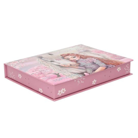 Pink jewelry box with a design of a girl and flowers on a white background
