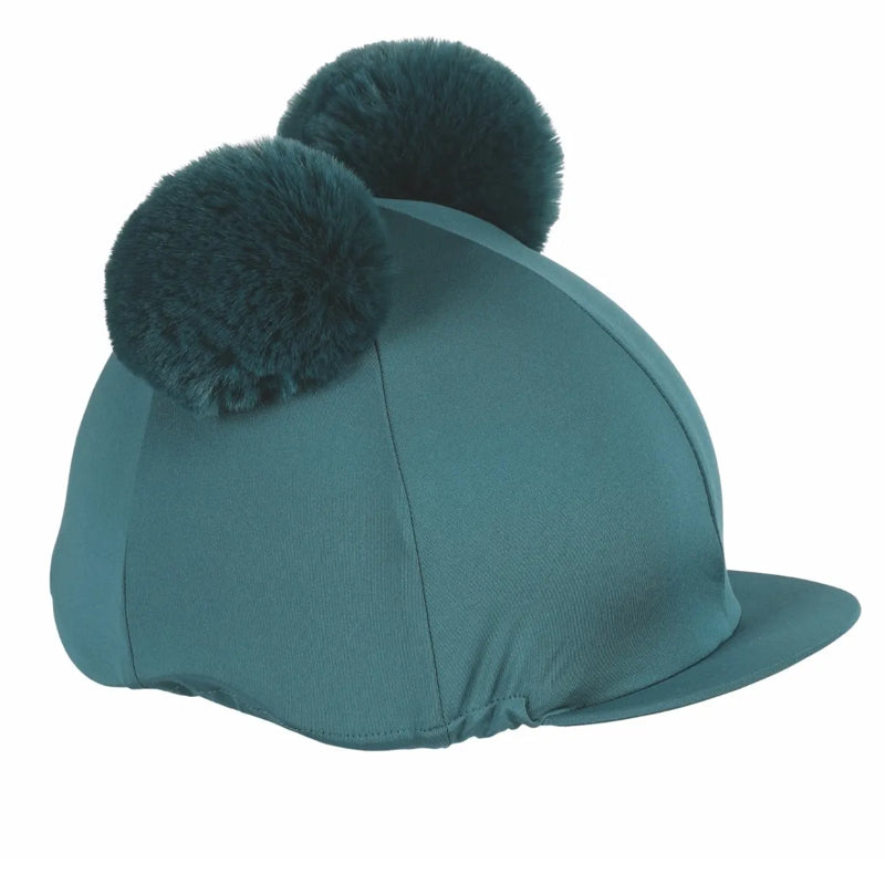 Teal riding hat with two dark green pom-poms on a white background