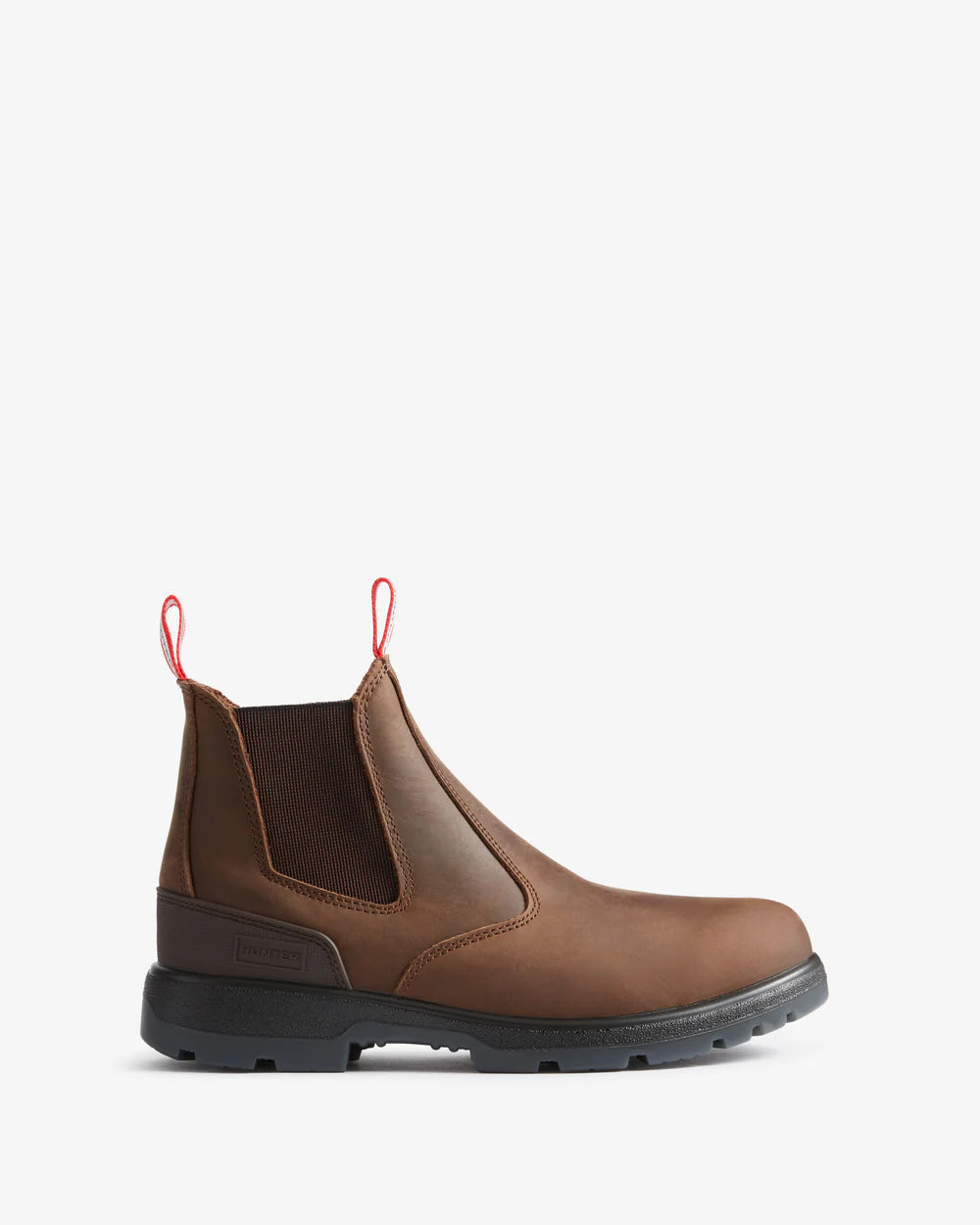 Brown leather boot with a black sole on a white background