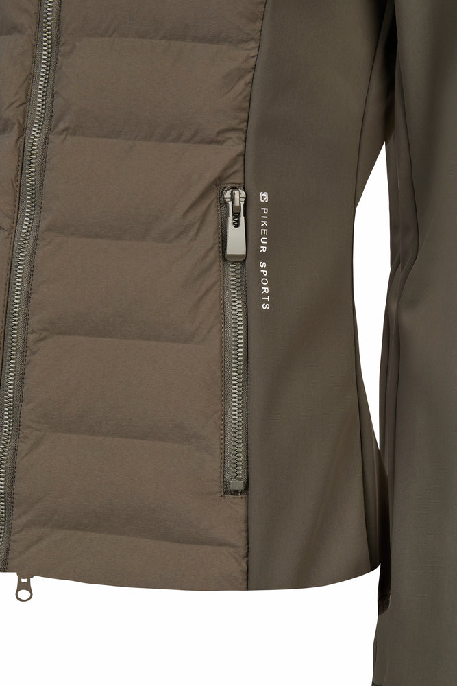 Close-up of a green jacket with a zipper and 'Pikeur' branding on a white background