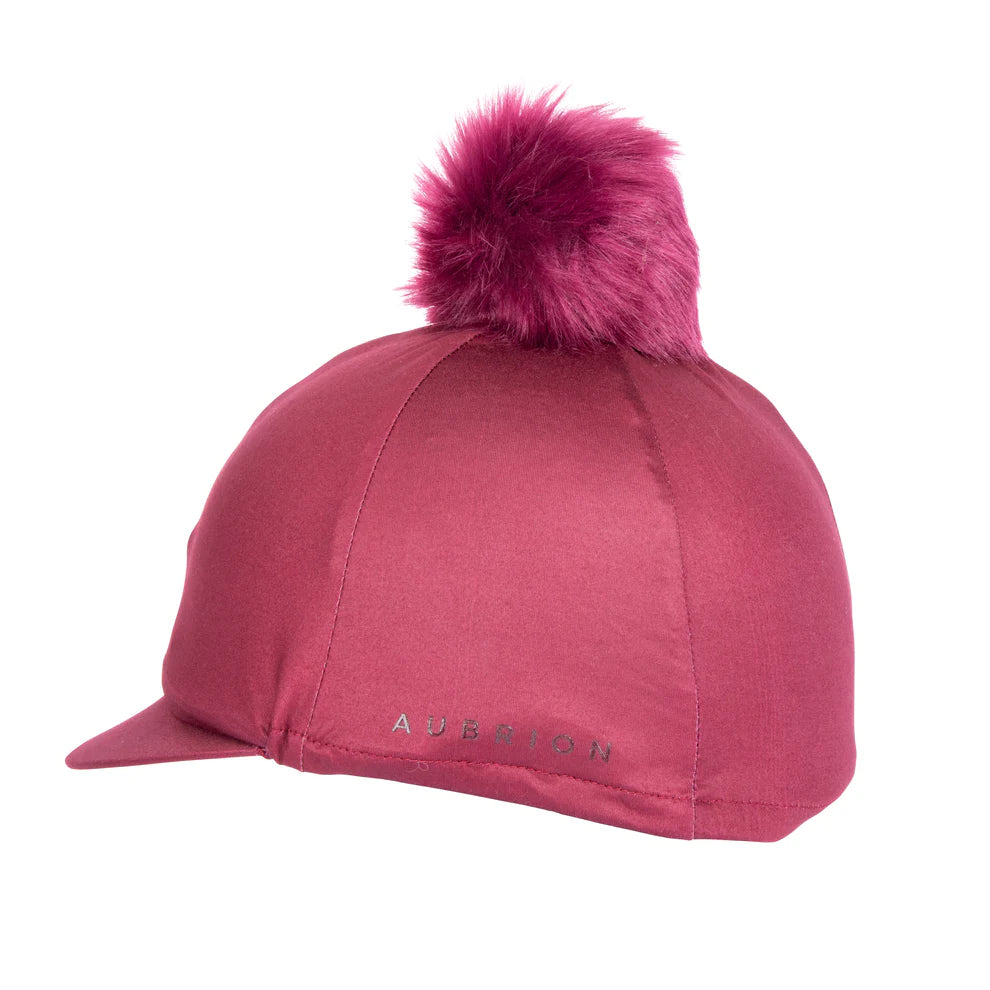 Burgundy hat silk with a matching pom pom on a white background
