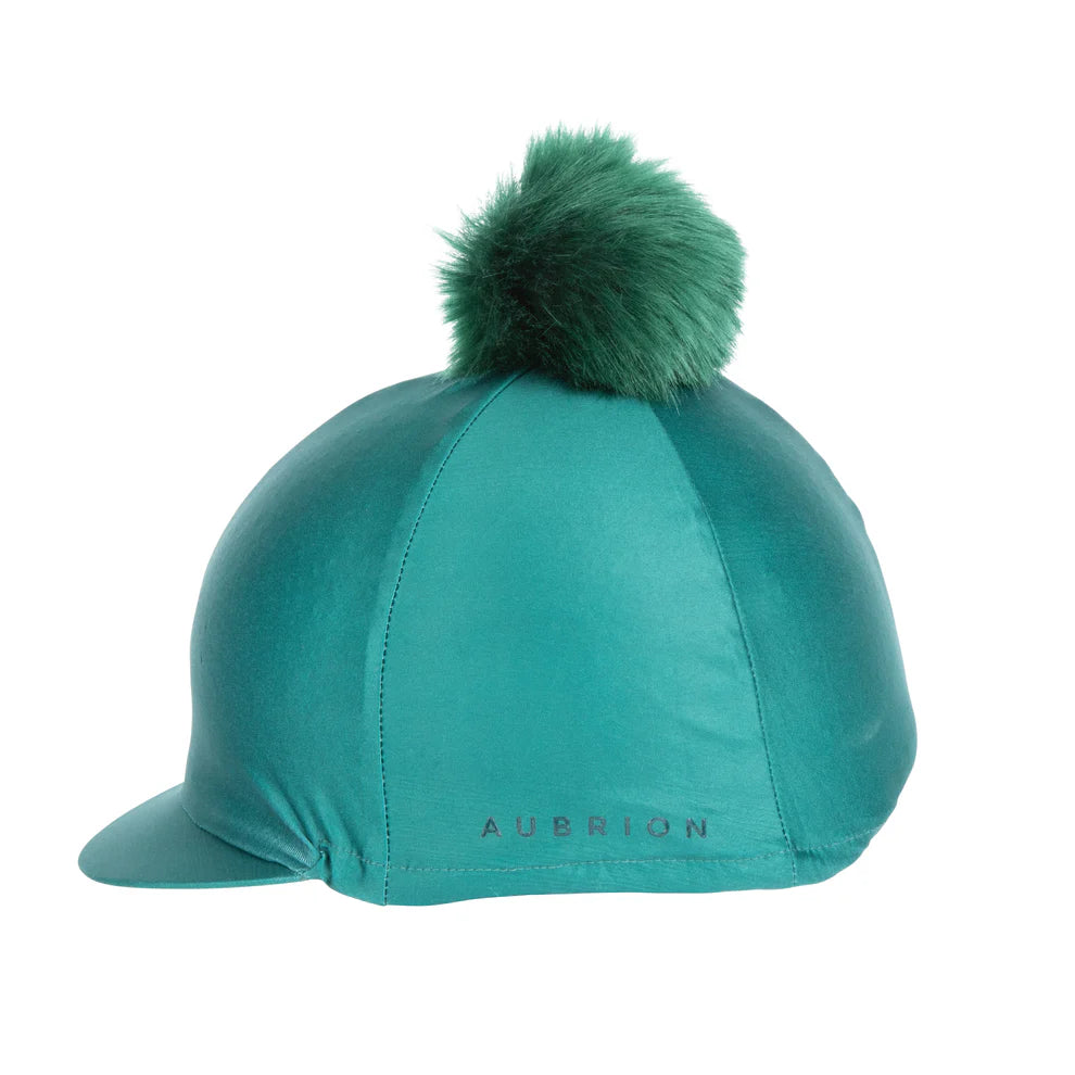 Green hat silk with a matching pom pom on a white background