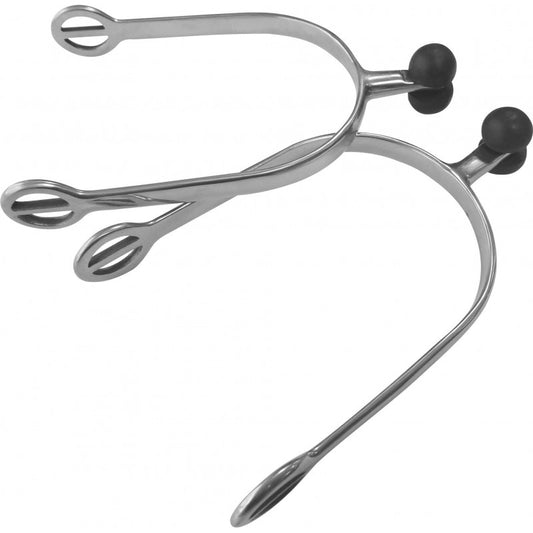 Metal spurs on a white background