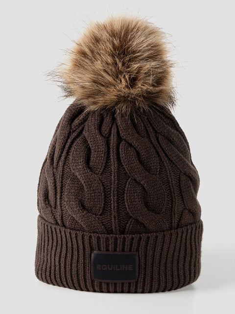 A dark brown cable-knit beanie hat with a large brown faux fur pom-pom on top and a black brand patch on the front cuff reading 'EQUILINE'.