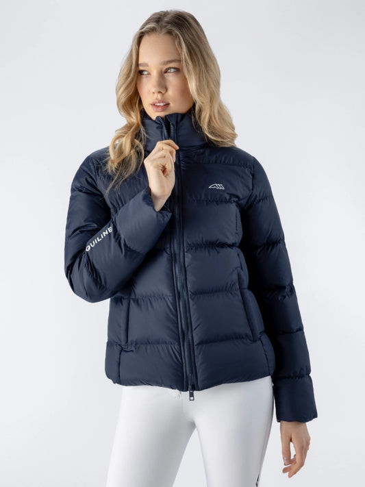 Woman wearing a navy blue puffer jacket on a white background