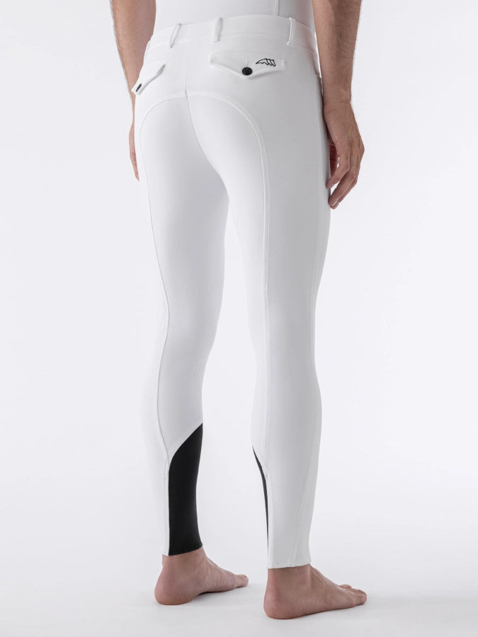 White equestrian pants with black accents on a white background