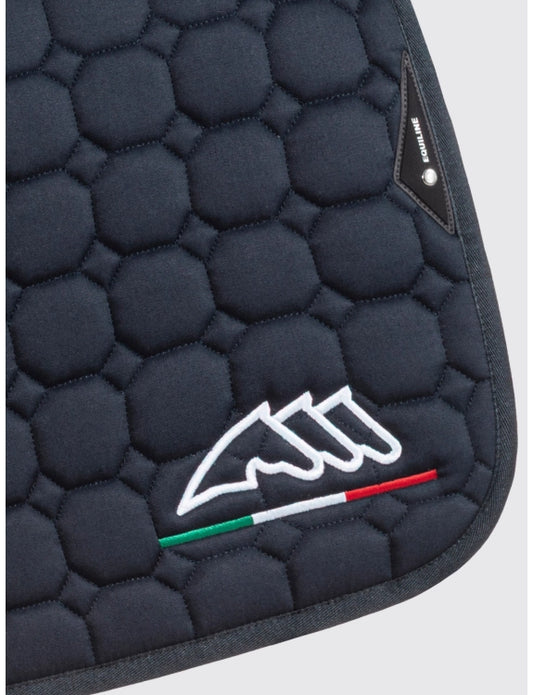Navy blue equestrian saddle pad with a logo on a light gray background