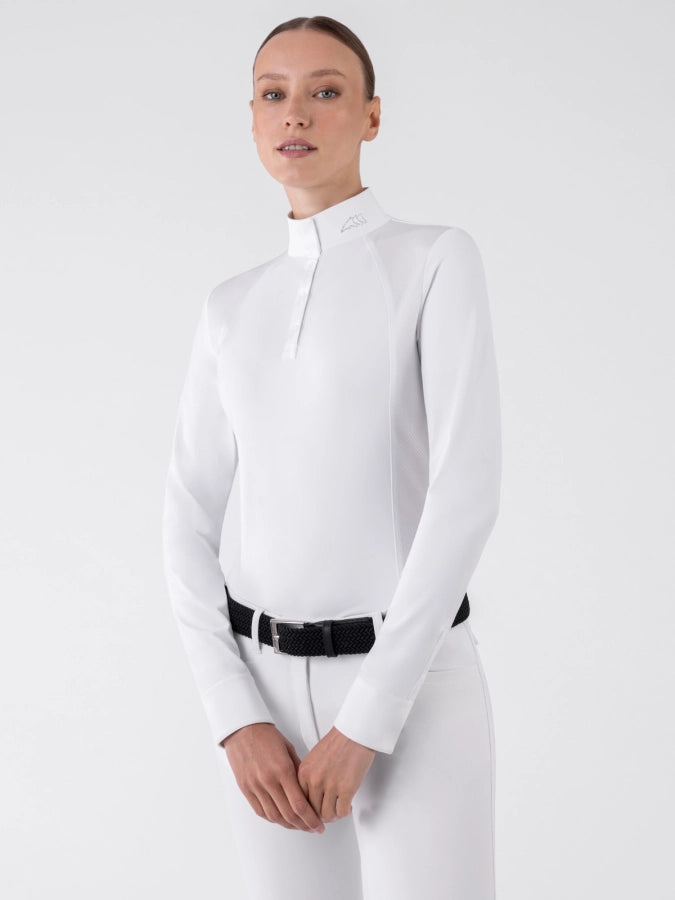 Person wearing a white long-sleeve shirt and white pants on a light gray background