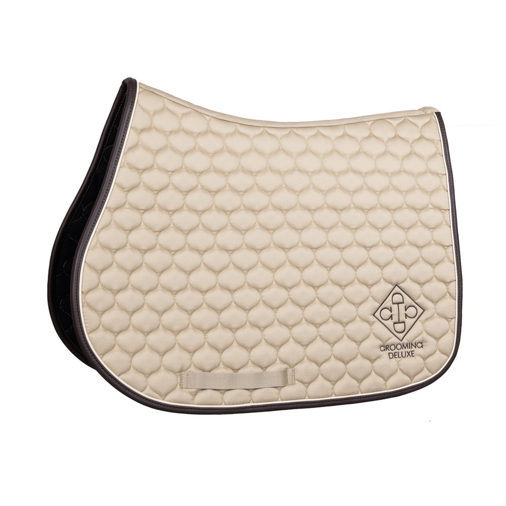 beige saddle pad on a transparent background