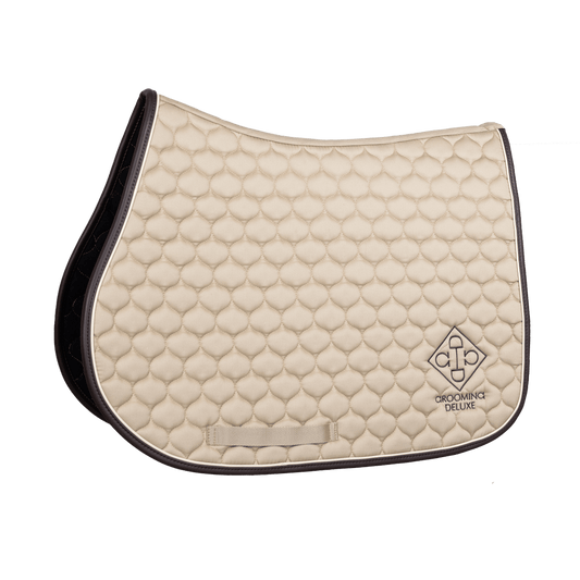 beige saddle pad on a transparent background