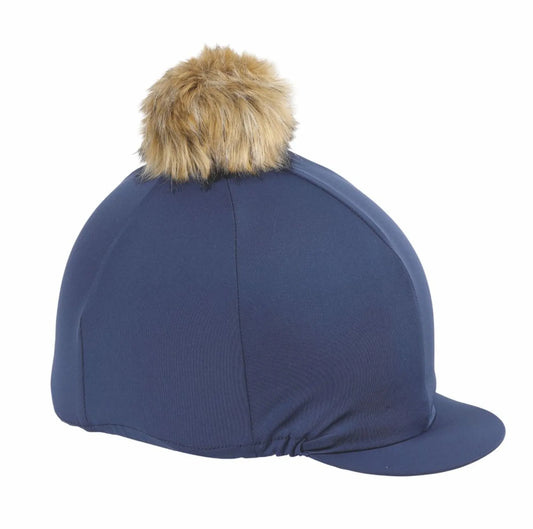 Navy riding hat with a brown fur pom-pom on a white background