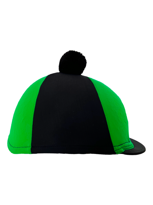 Green and black cap with a pom-pom on a white background