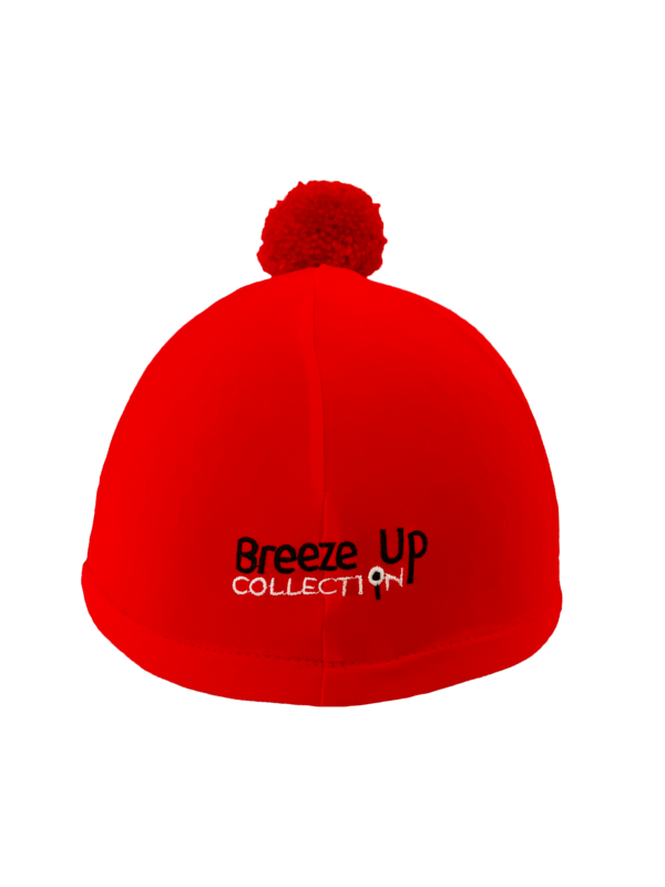 Red hat silk with pom-pom and 'Breeze Up Collection' logo on a white background