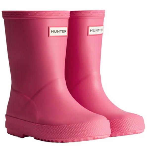 bright pink hunter kids wellington boots on a with backround