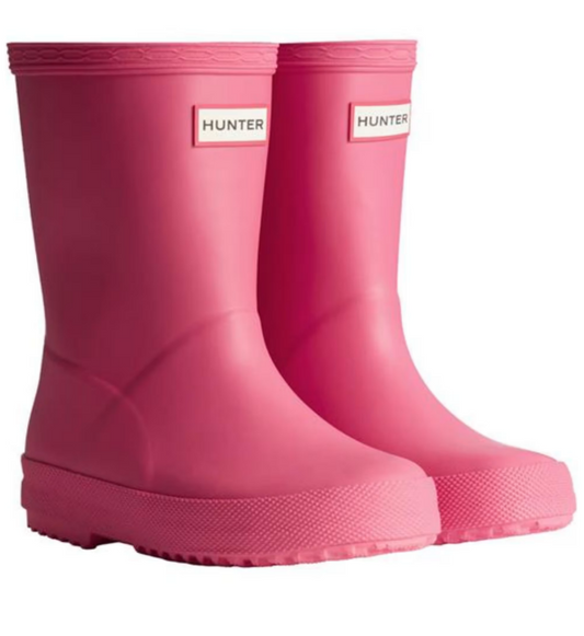 bright pink hunter kids wellington boots on a with backround