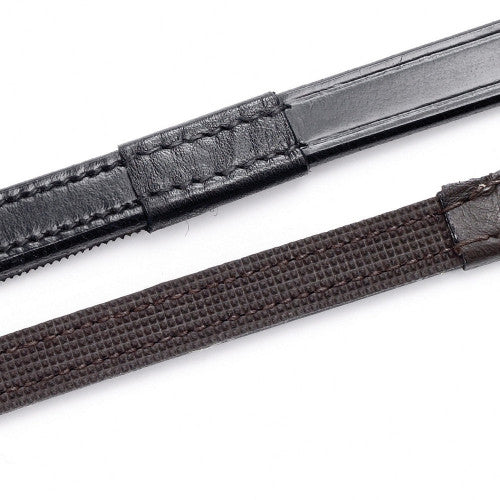 Two brown leather reins on a white background