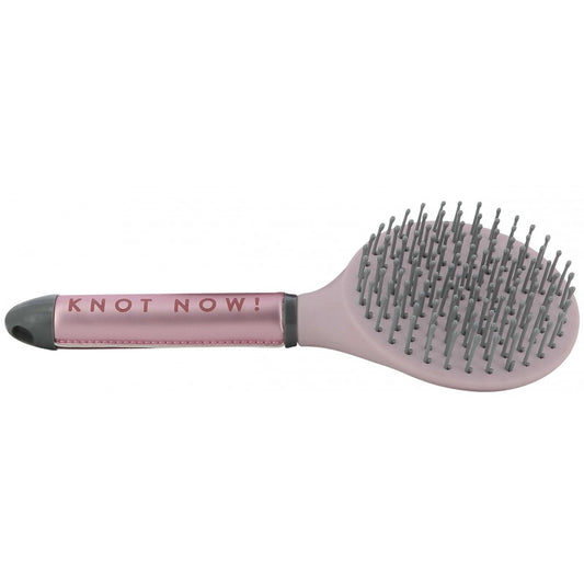 A pink and gray hairbrush with the brand name 'KNOT NOW!' printed on the handle, shown against a plain white background.