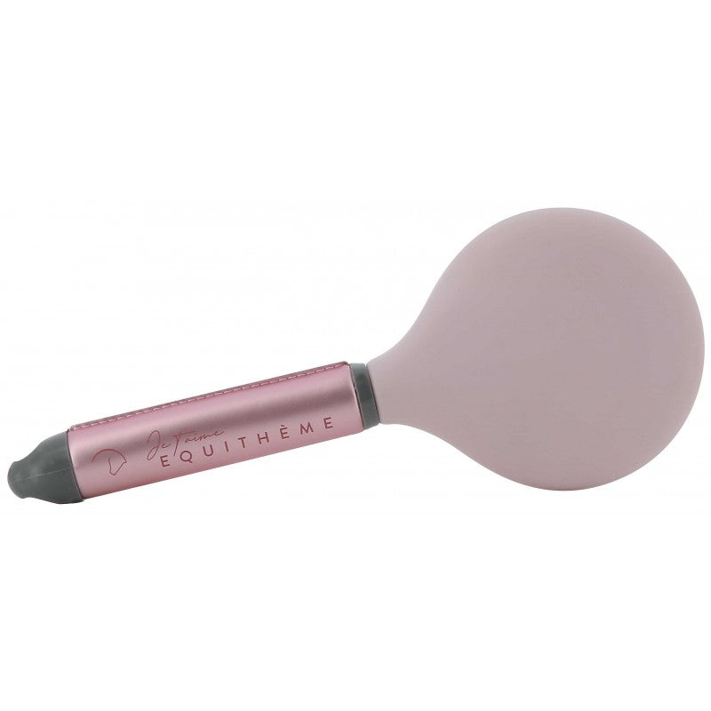 Pink brush with a brand name on a white background