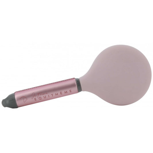 Pink brush with a brand name on a white background