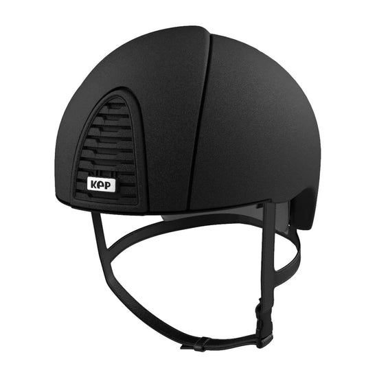 A matte black equestrian riding helmet with a visible KEP logo patch on the side, shown against a plain white background.