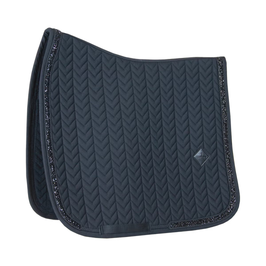 Black saddle pad with a subtle pattern on a transparent background