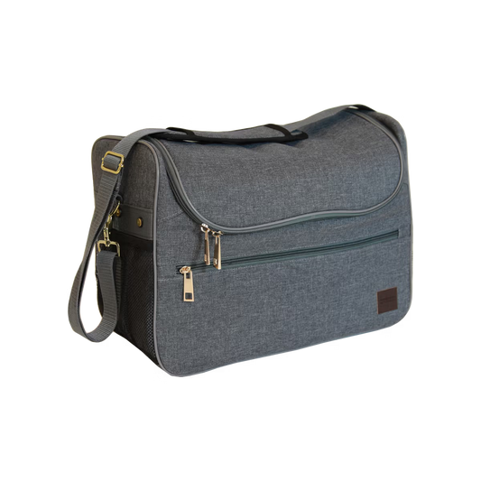 Gray grooming bag with gold zipper pulls on a white background