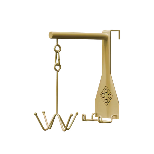 Gold bridle hook on a white background