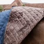 Textured fabric surface with a patterned design