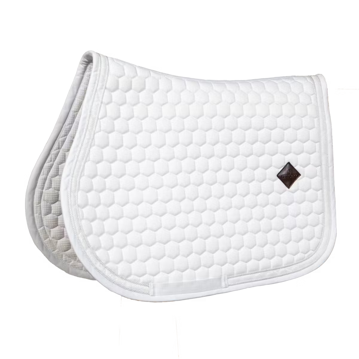 White quilted saddle pad with a diamond pattern on a white background