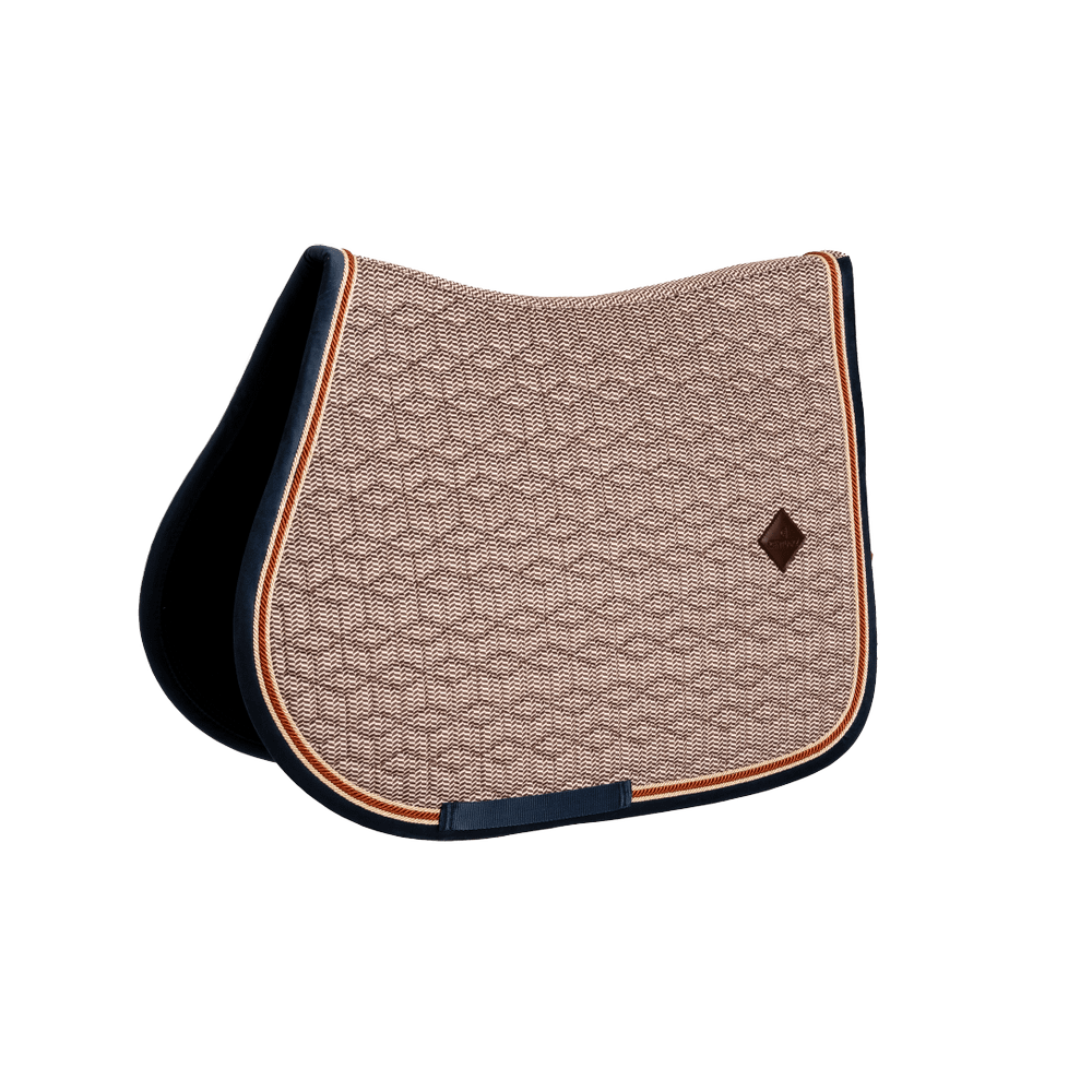 Patterned saddle pad with a diamond logo on a black background