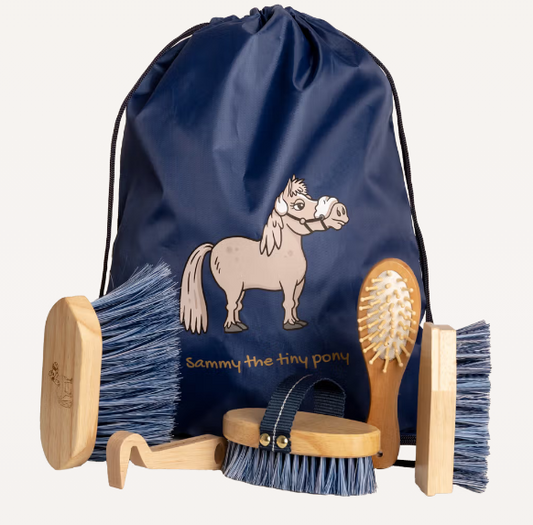 Navy drawstring bag with horse design and horse grooming tools on a white background