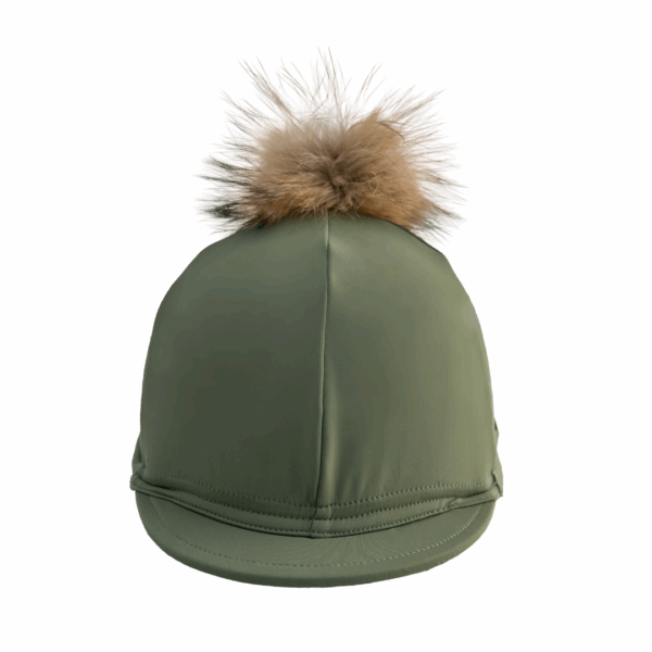 Green cap with a fur pom-pom on a white background