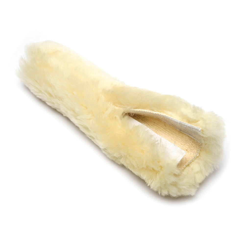 Cream-colored noseband cover on a white background
