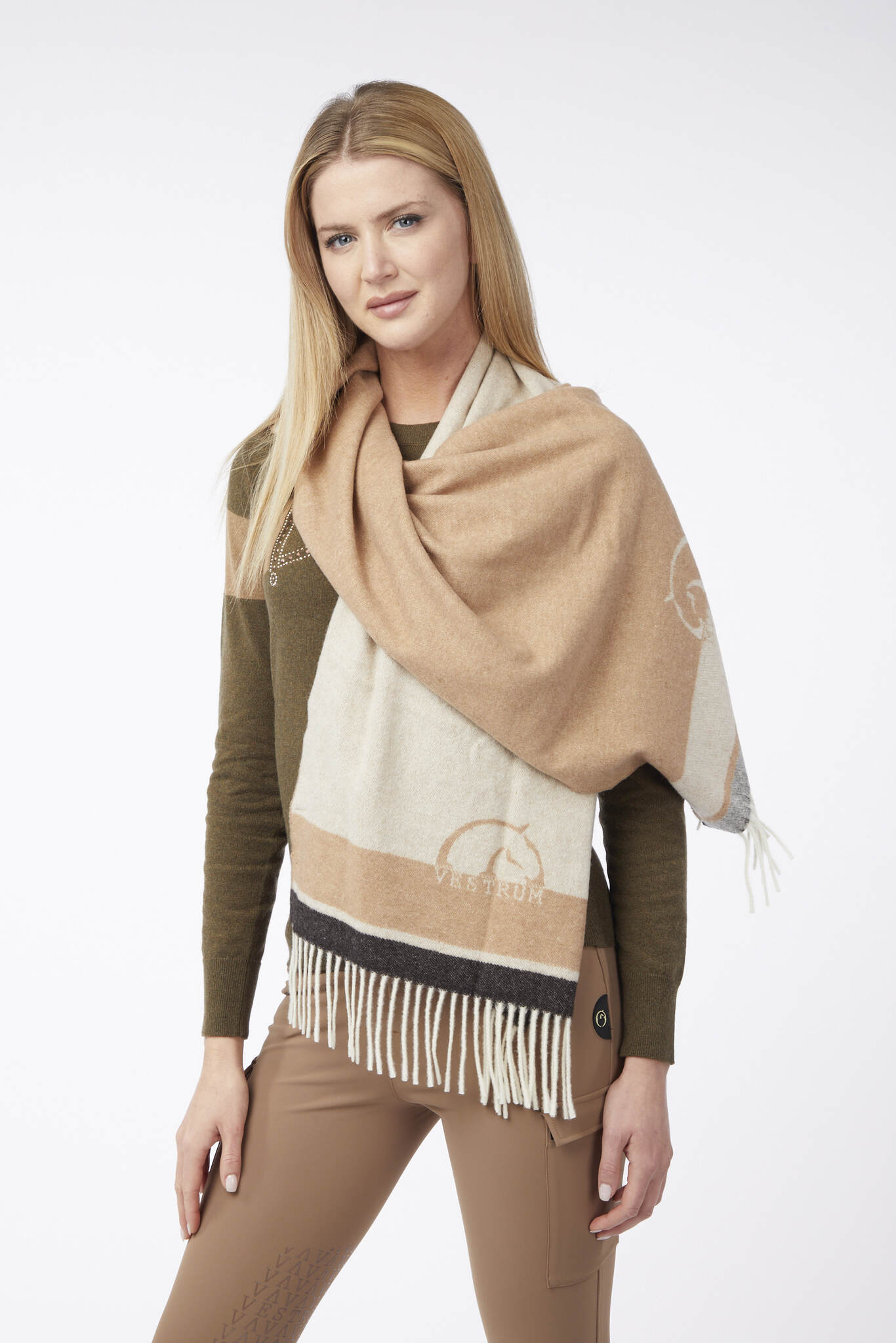 Woman wearing a beige and white scarf with a brand logo on a white background