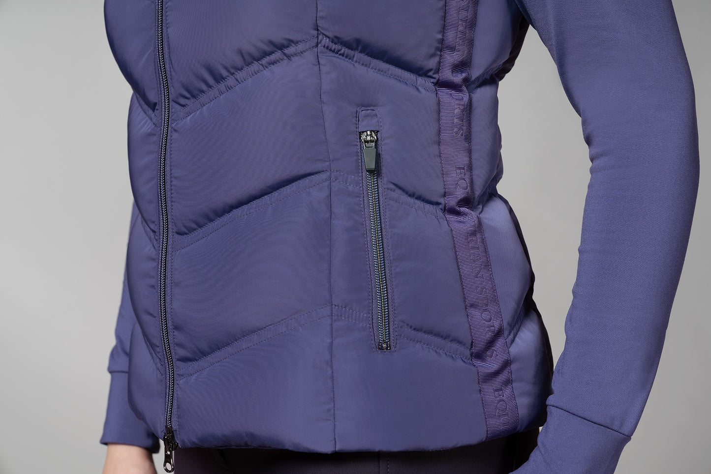 Zip of a blue gilet