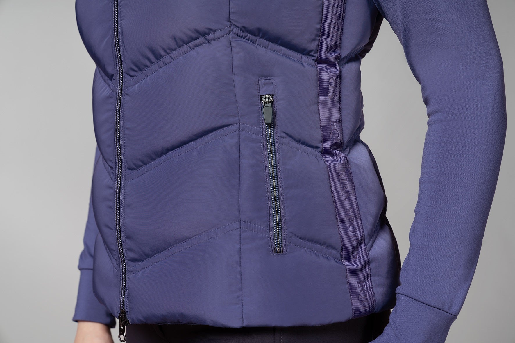 Zip of a blue gilet