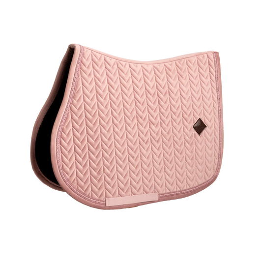 Pink saddle pad on a white background