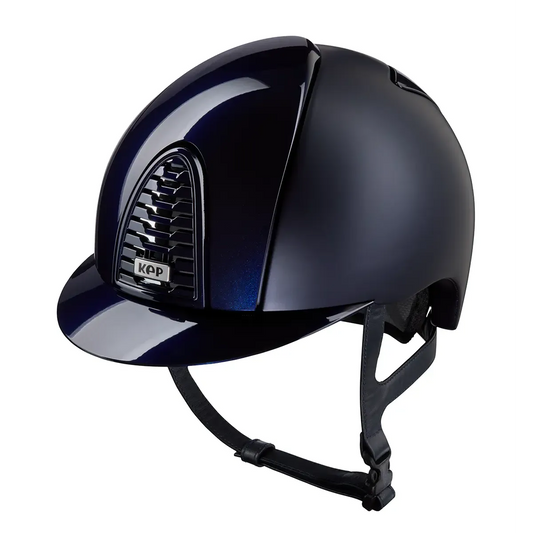 Navy riding helmet with visor on a white background