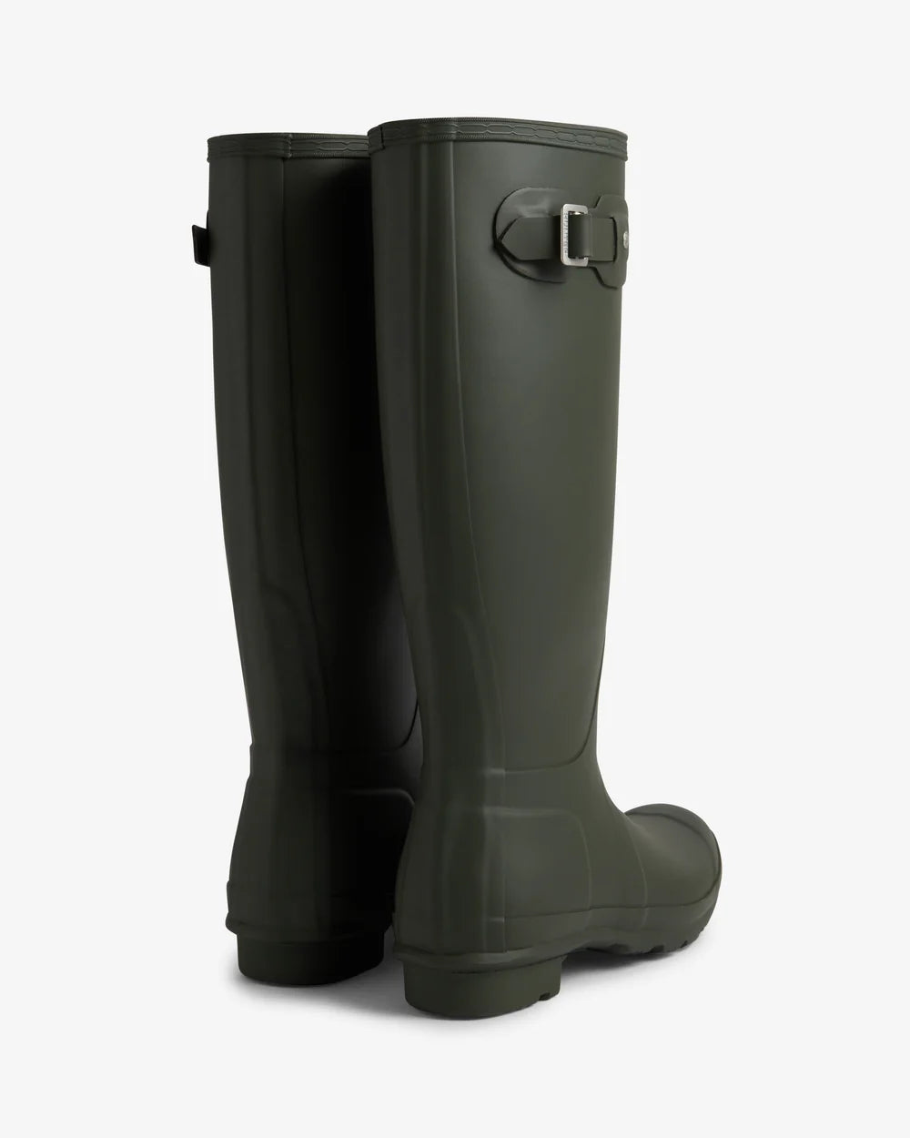 Pair of green rubber boots on a white background