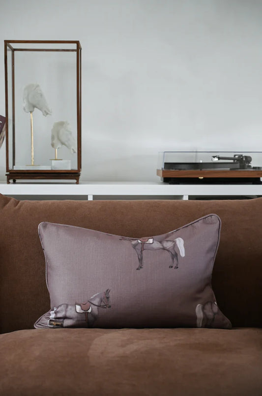 Brown cushion on a brown sofa