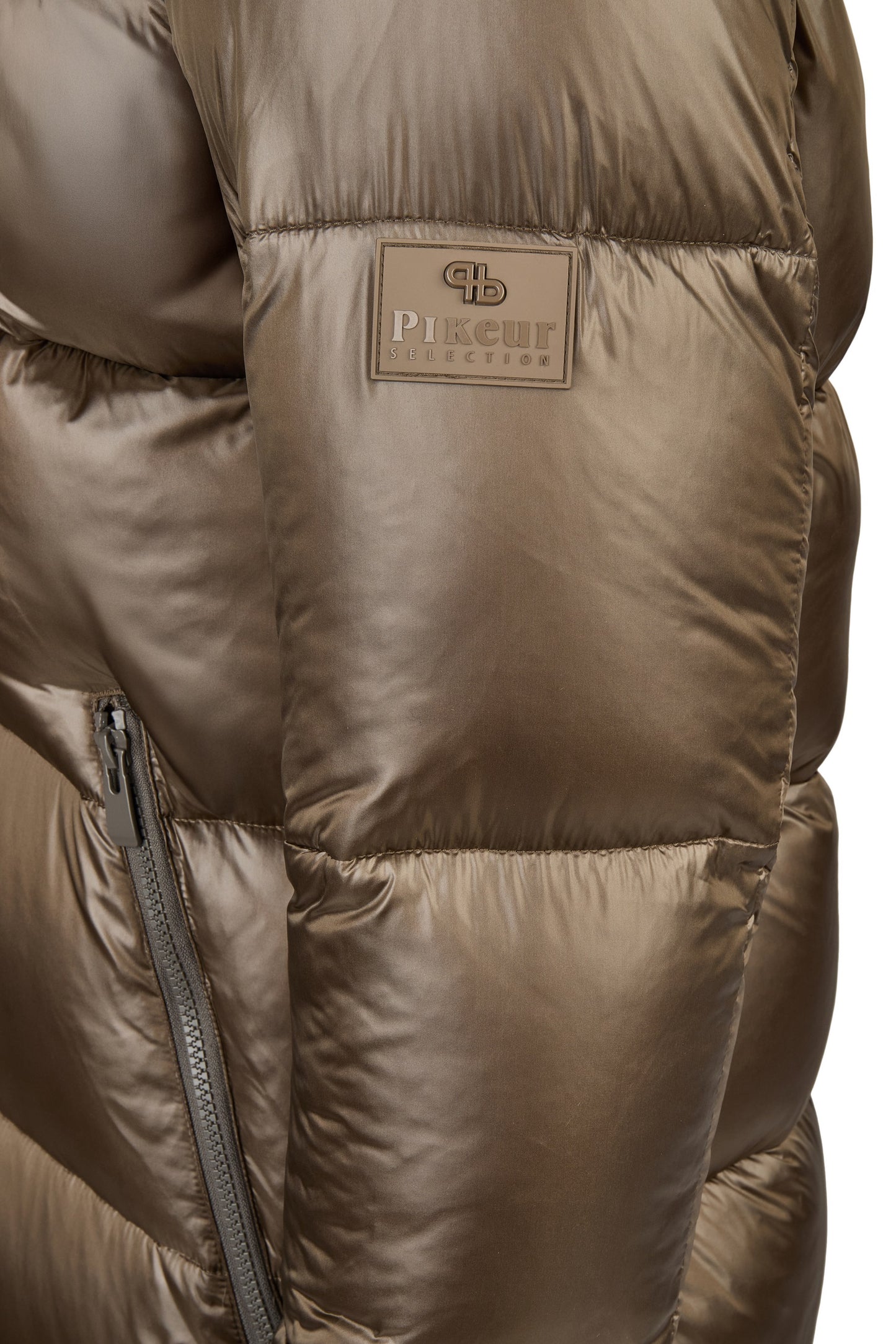 Close-up of a brown puffer jacket with a brand logo on a white background