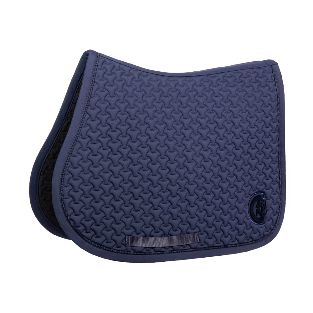 Navy blue saddle pad with a textured pattern on a white background