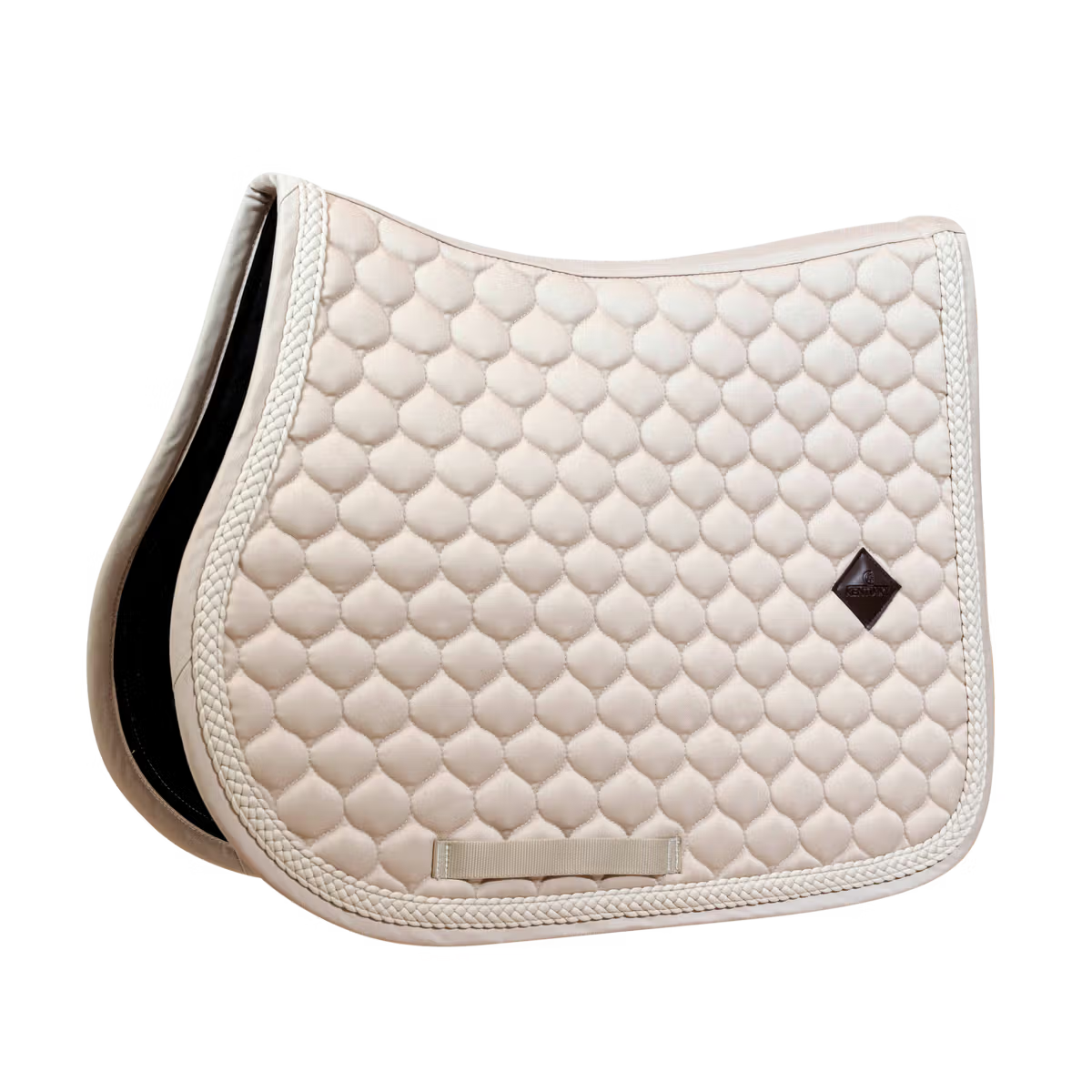 Quilted beige saddle pad on a white background