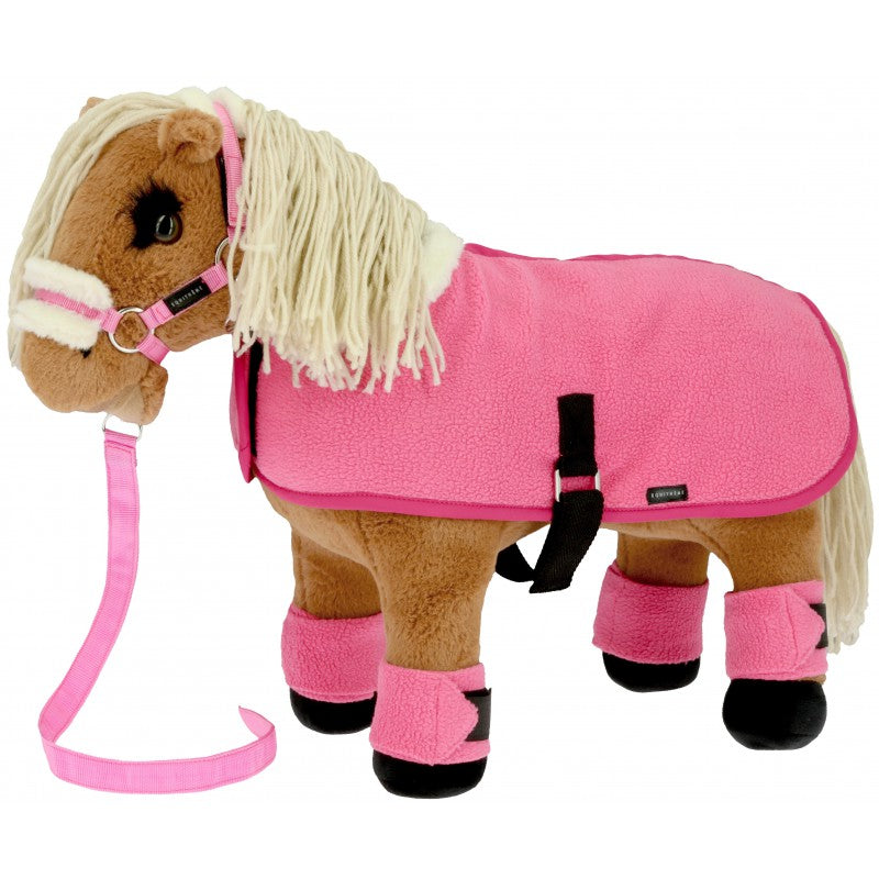 A plush toy horse wearing a bright pink fleece turnout blanket, pink halter, pink lead rope, and pink leg wraps with black accents, photographed on a clean white background.