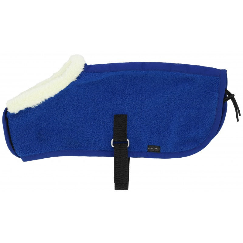 Blue rug with white fur trim on a white background