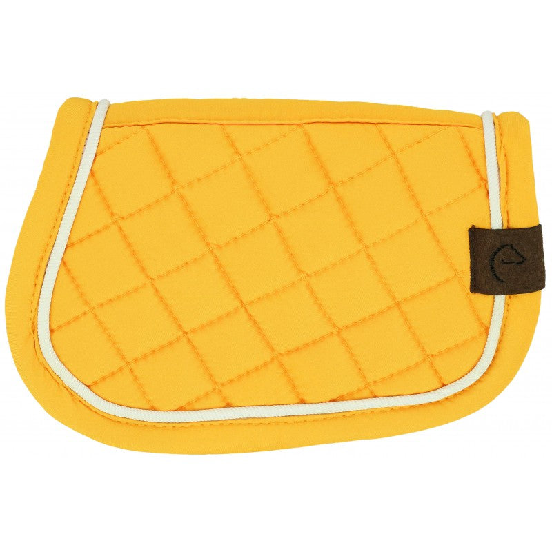 Yellow quilted pad with a brown tag on a white background