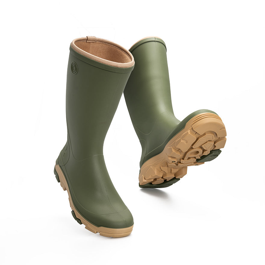 Pair of green rubber boots with brown soles on a white background