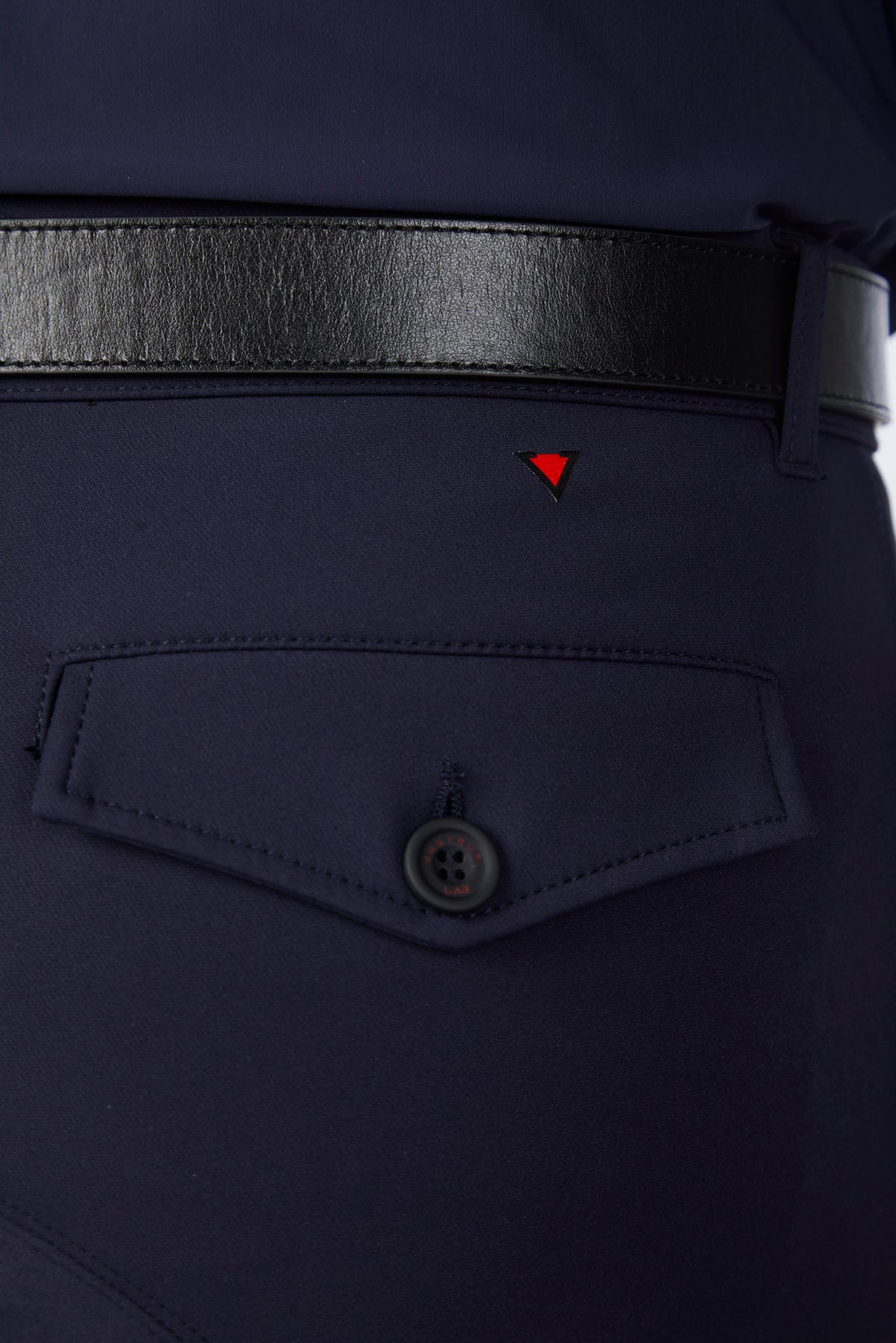 Navy blue pants with a black belt and a red triangle logo on the pocket.